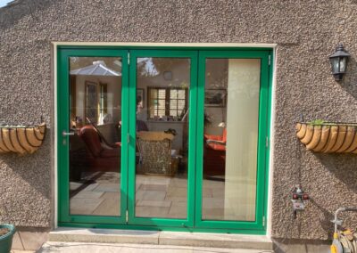 Green Suffolk Bifold Doors
